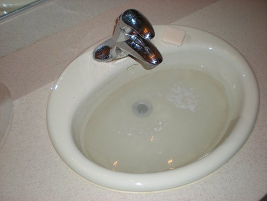 Unclog and clean your drain using baking soda and vinegar