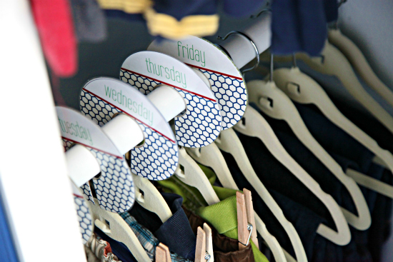 Use hanger tabs to separate clothes into daily outfits