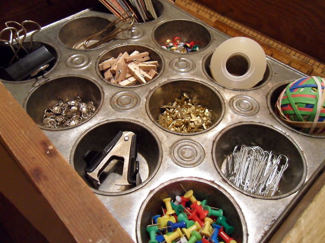 Use muffin tins with their handy compartments to hold odds and ends like crafting items or office supplies