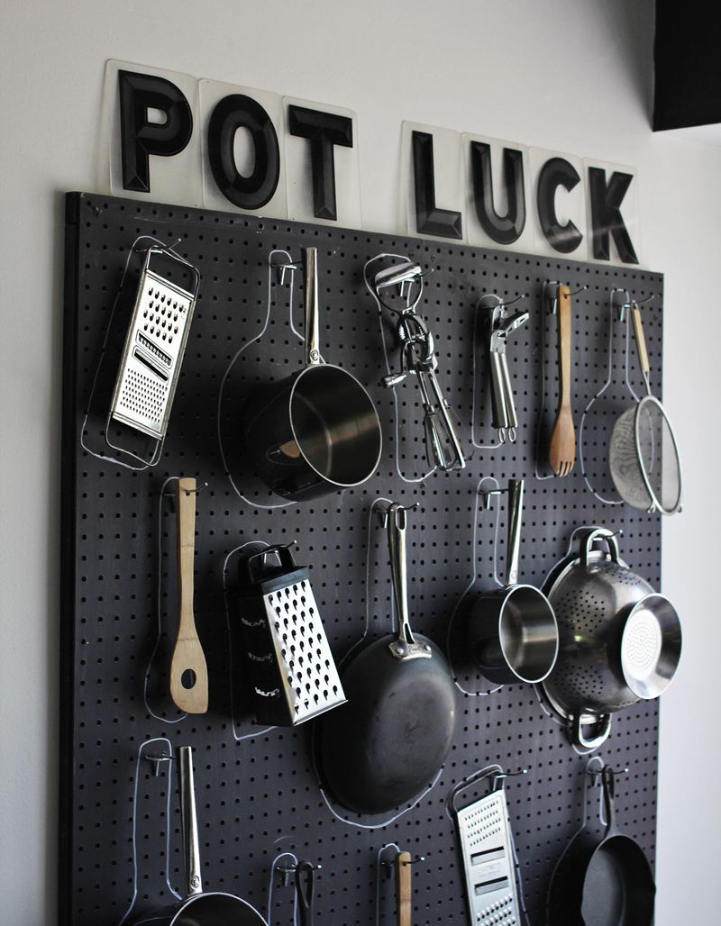Transform a bare wall into a storage space by installing a pegboard