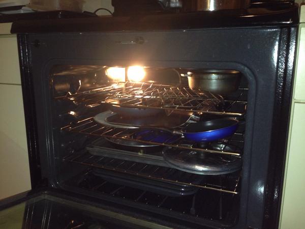 You can store pots and pans that you don’t use often inside of the oven