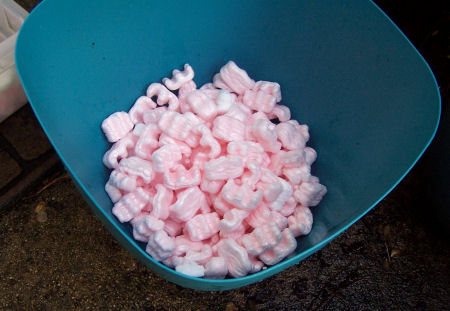 Use packing peanuts in the bottom of your large pots to make them lighter and easier to move around