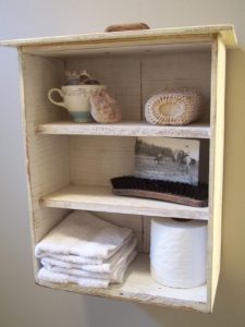 Old drawer turned into a bathroom shelves