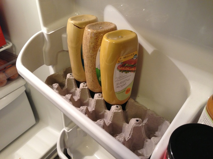 Use the bottom of an egg carton to hold your inverted mustard bottles